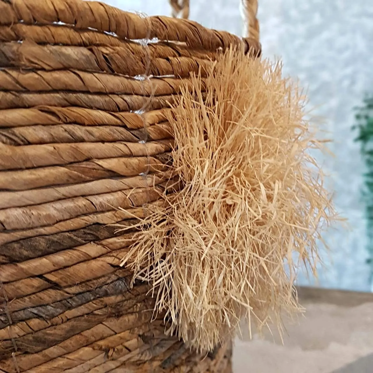 Natural Woven Banana Leaf Round Basket With Grass Pom-Poms
